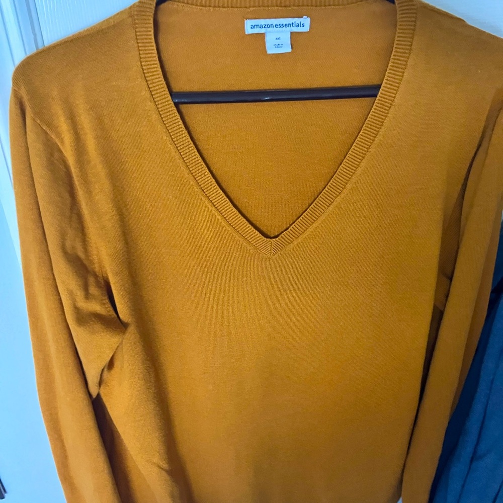 Women’s lightweight sweater with matching beanie cap, golden pumpkin color, 1X.